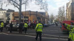 The Pathetic group of fascists gather outside the tube station.