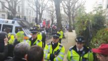 Police guarding the tiny group of fascists